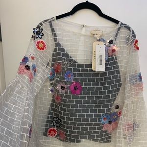 Beaded white sheer top with bell sleeves